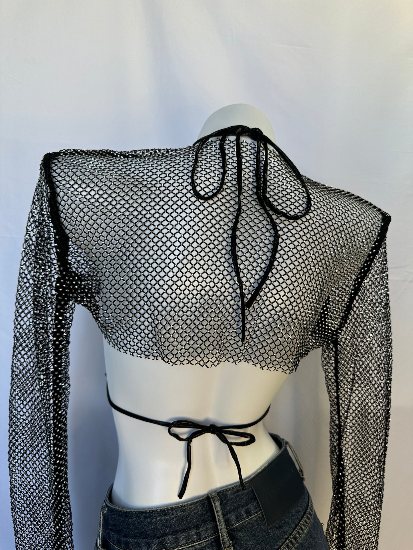 Top con brillo con cubierta transparente