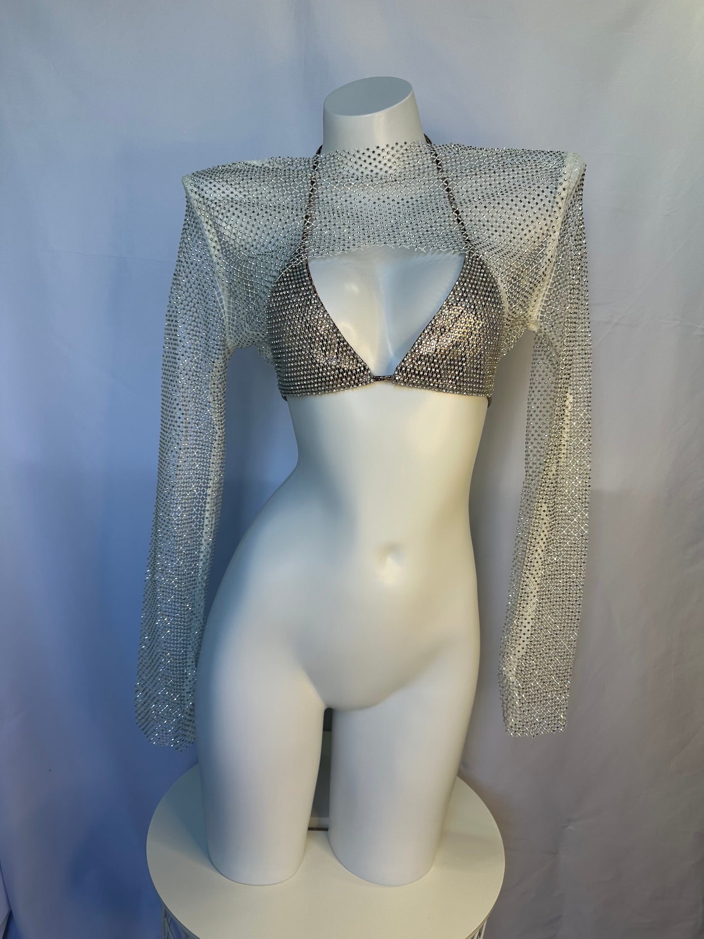 Top con brillo con cubierta transparente