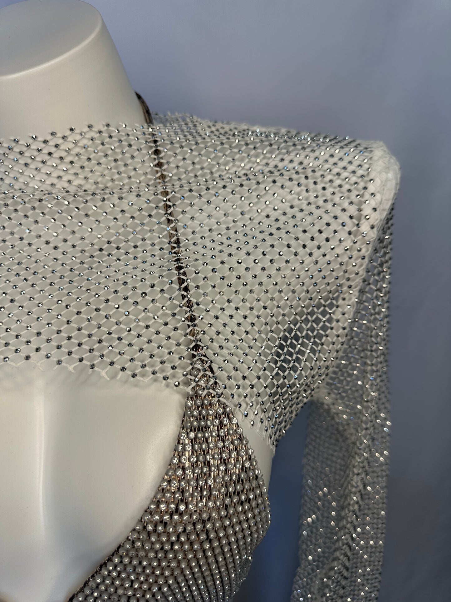 Top con brillo con cubierta transparente